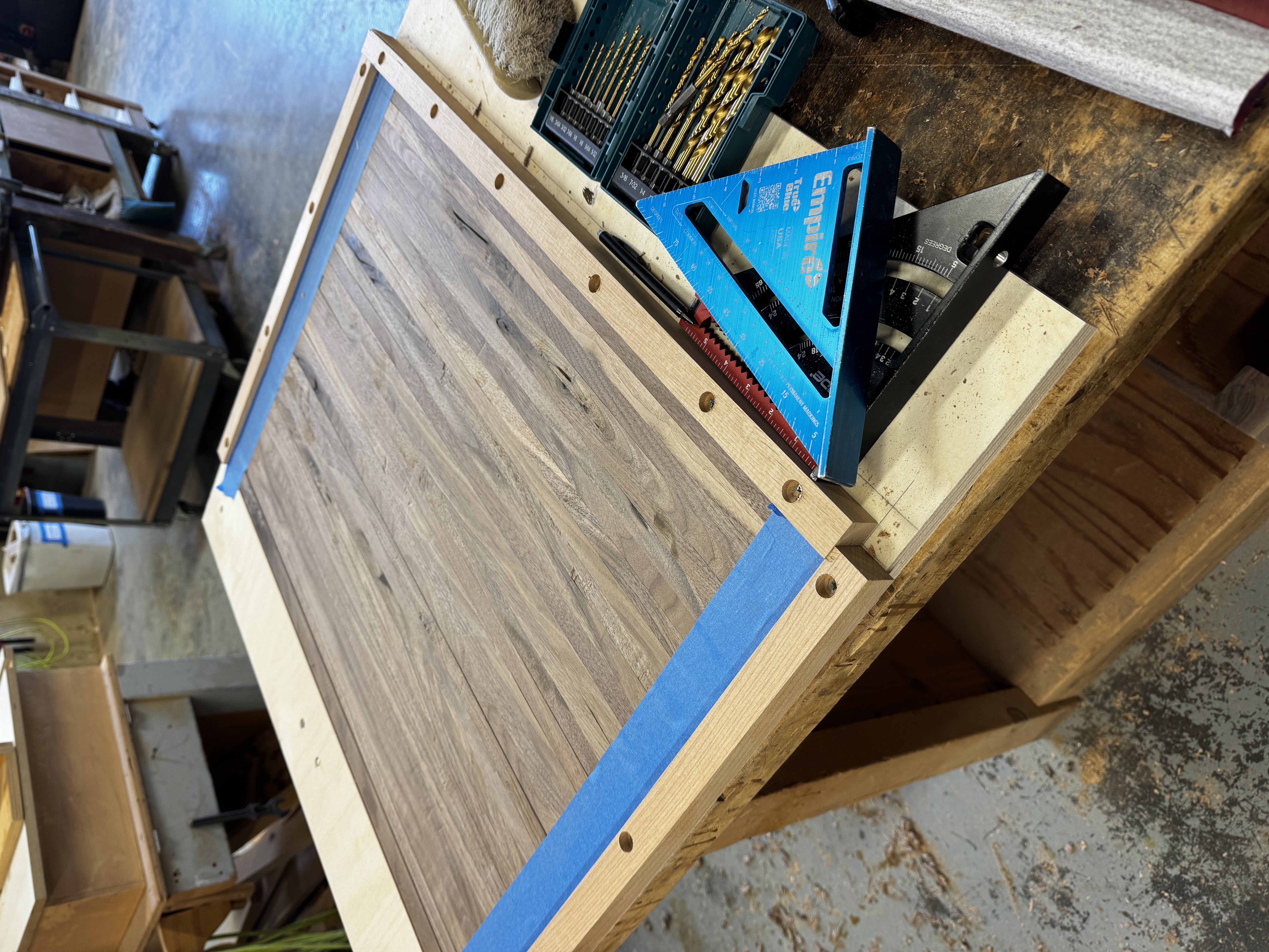 Gluing up the door slats to create the tambour doors.